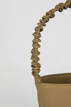 Intentionally Blank ACCESSORIES SCRUNCHIE BUCKET BAG Toffee Vegan 11 Intentionally Blank ACCESSORIES SCRUNCHIE BUCKET BAG Toffee Vegan