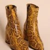 Intentionally Blank LIMA HEELED BOOT Mustard Python 1 Intentionally Blank LIMA HEELED BOOT Mustard Python