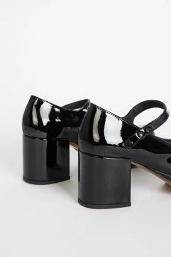 Intentionally Blank MIKA PLATFORM MARY JANE Black Patent 11 Intentionally Blank MIKA PLATFORM MARY JANE Black Patent